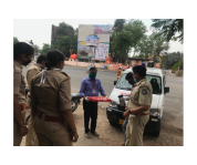 Bankers Team helping the needy people on the roads today by distributing food packets due to COVID-19 